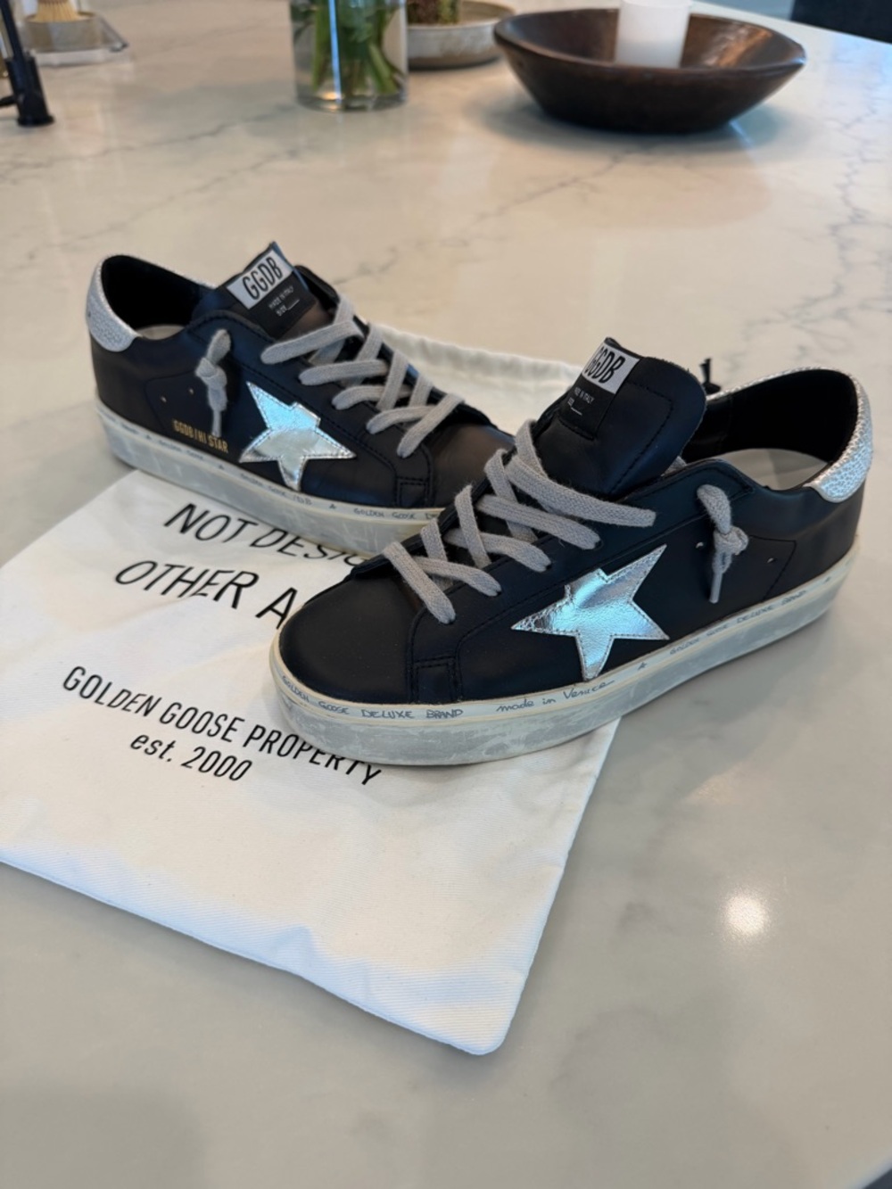 Golden Goose Black Hi Star shoes. Excellent condition like new!